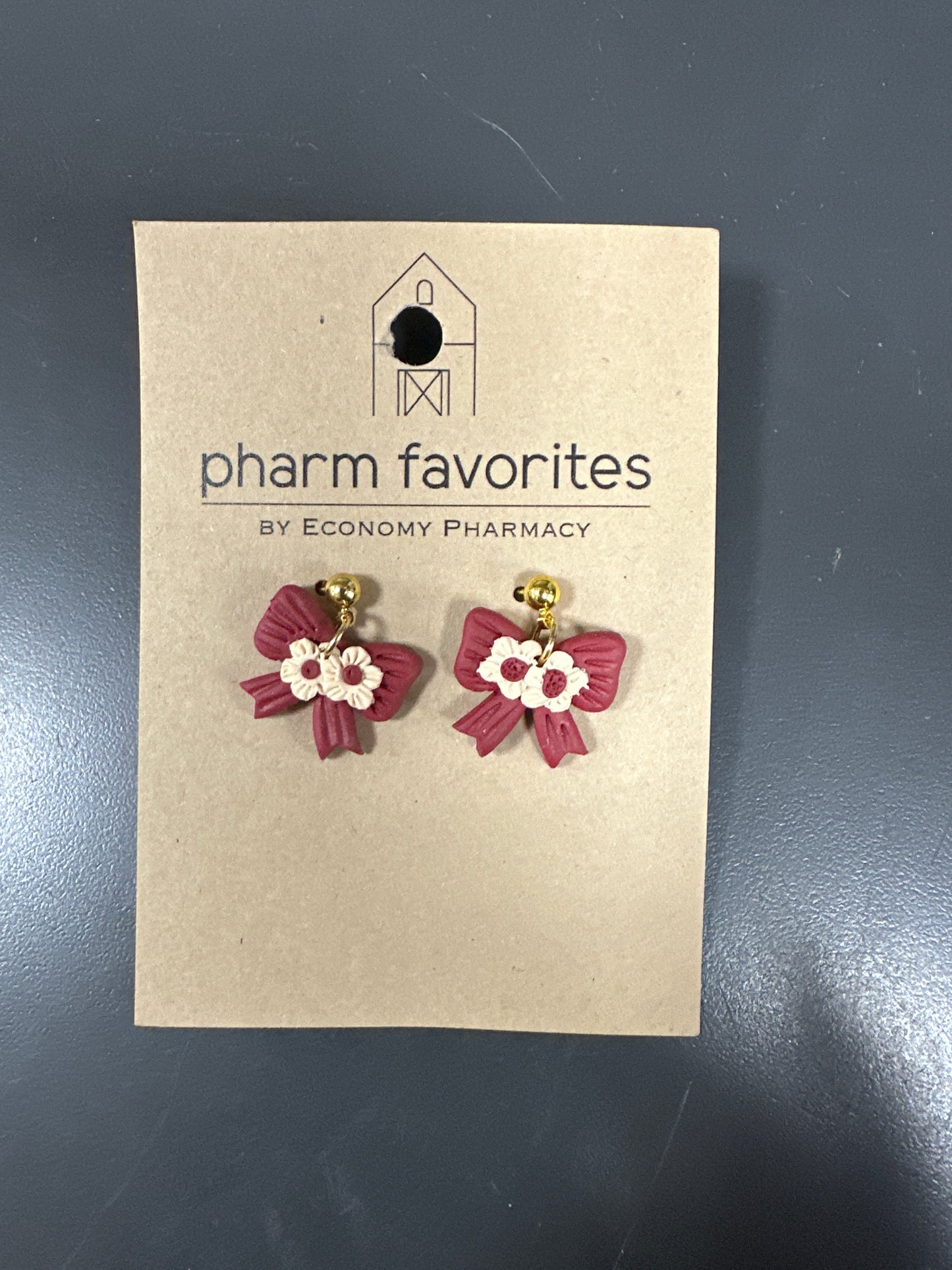 MAROON CLAY BOW EARRINGS WITH TAN FLOWERS