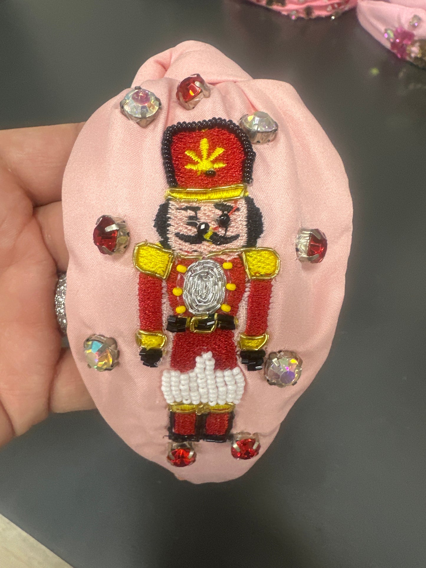 Pink Headband w/ Red, Black & Yellow Nutcracker