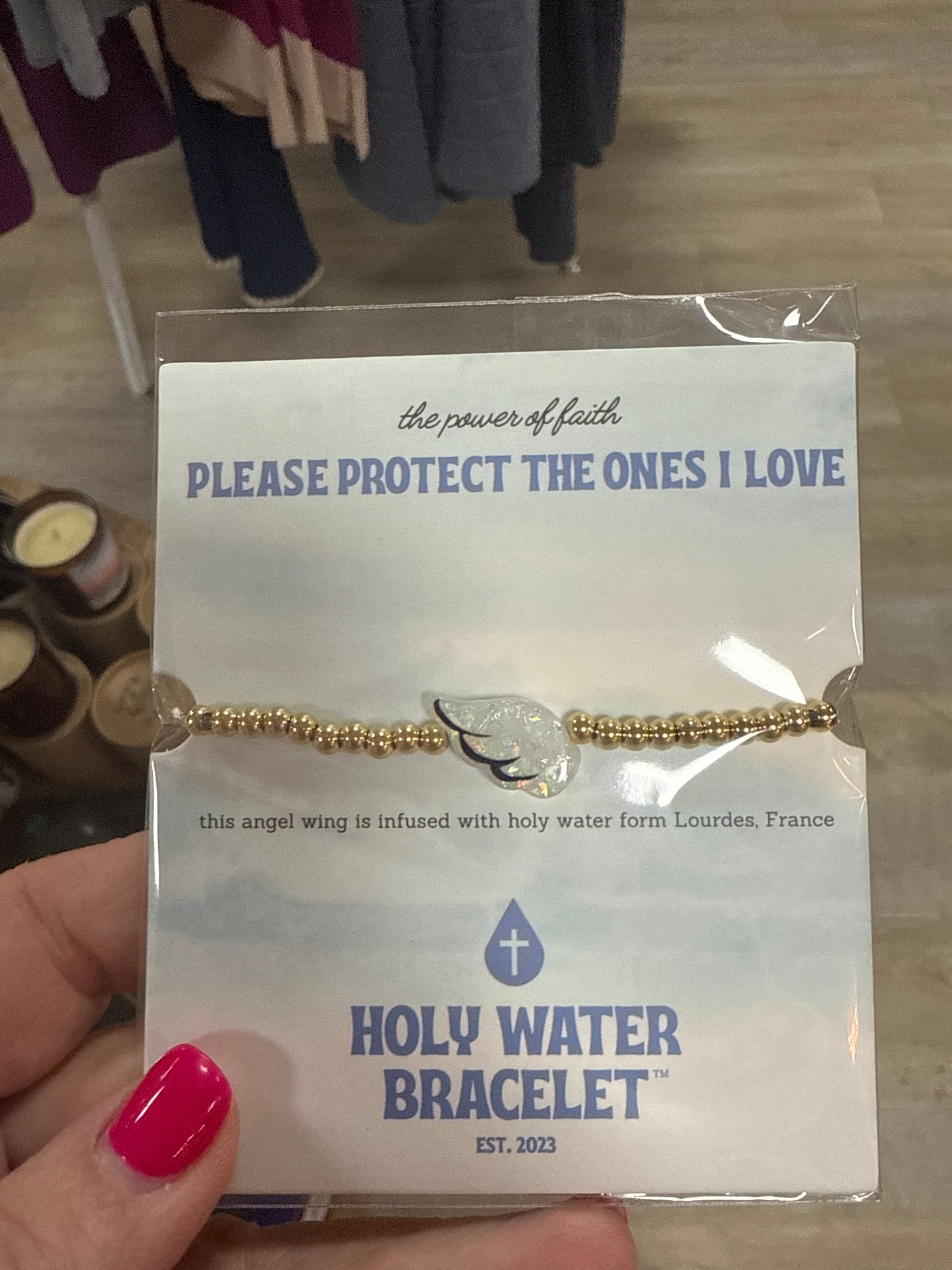 HOLY WATER ANGEL WING BRCLT IN GOLD