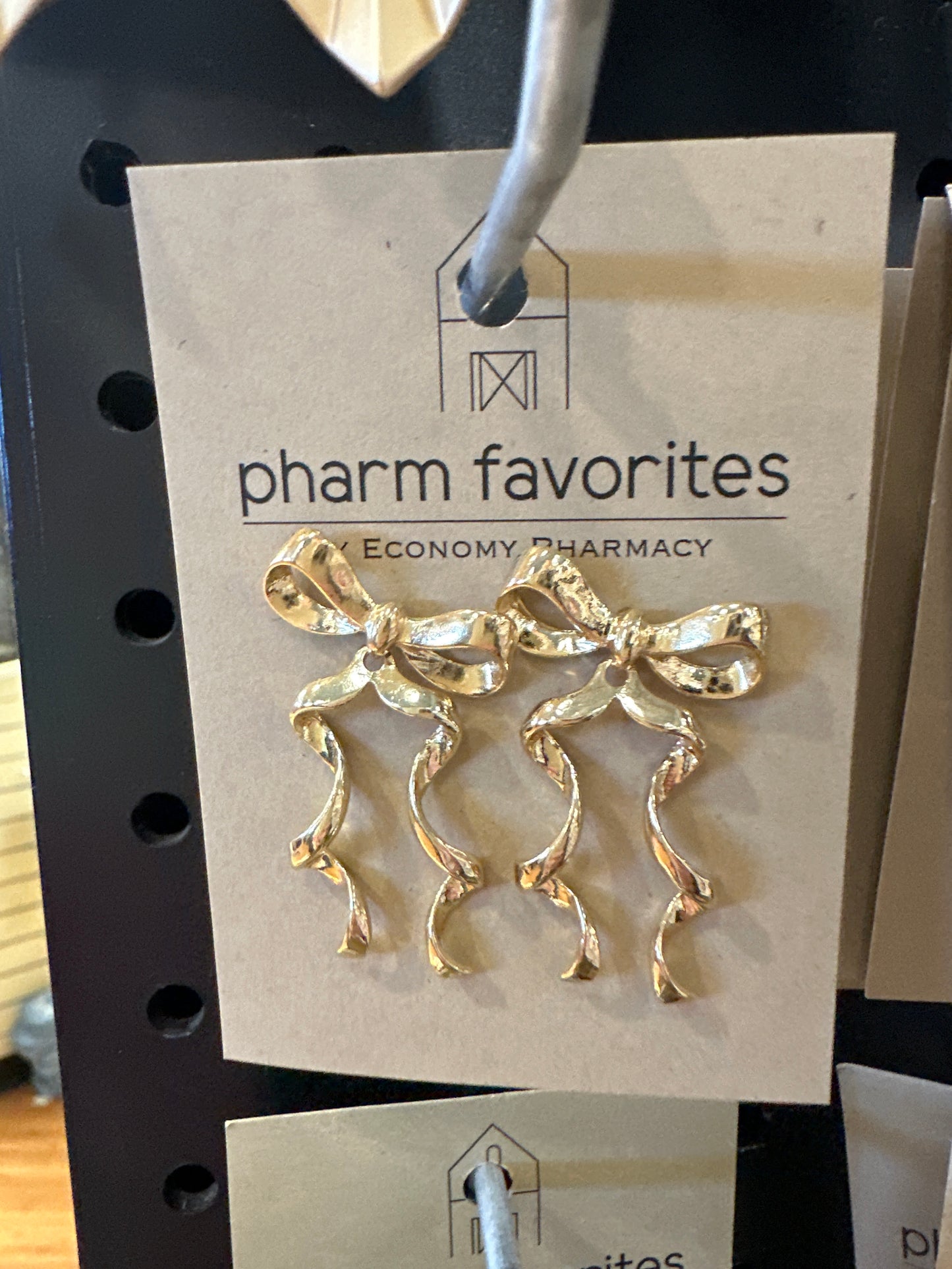 GOLD WAVED RIBBON BOW STUD 2" EARRINGS