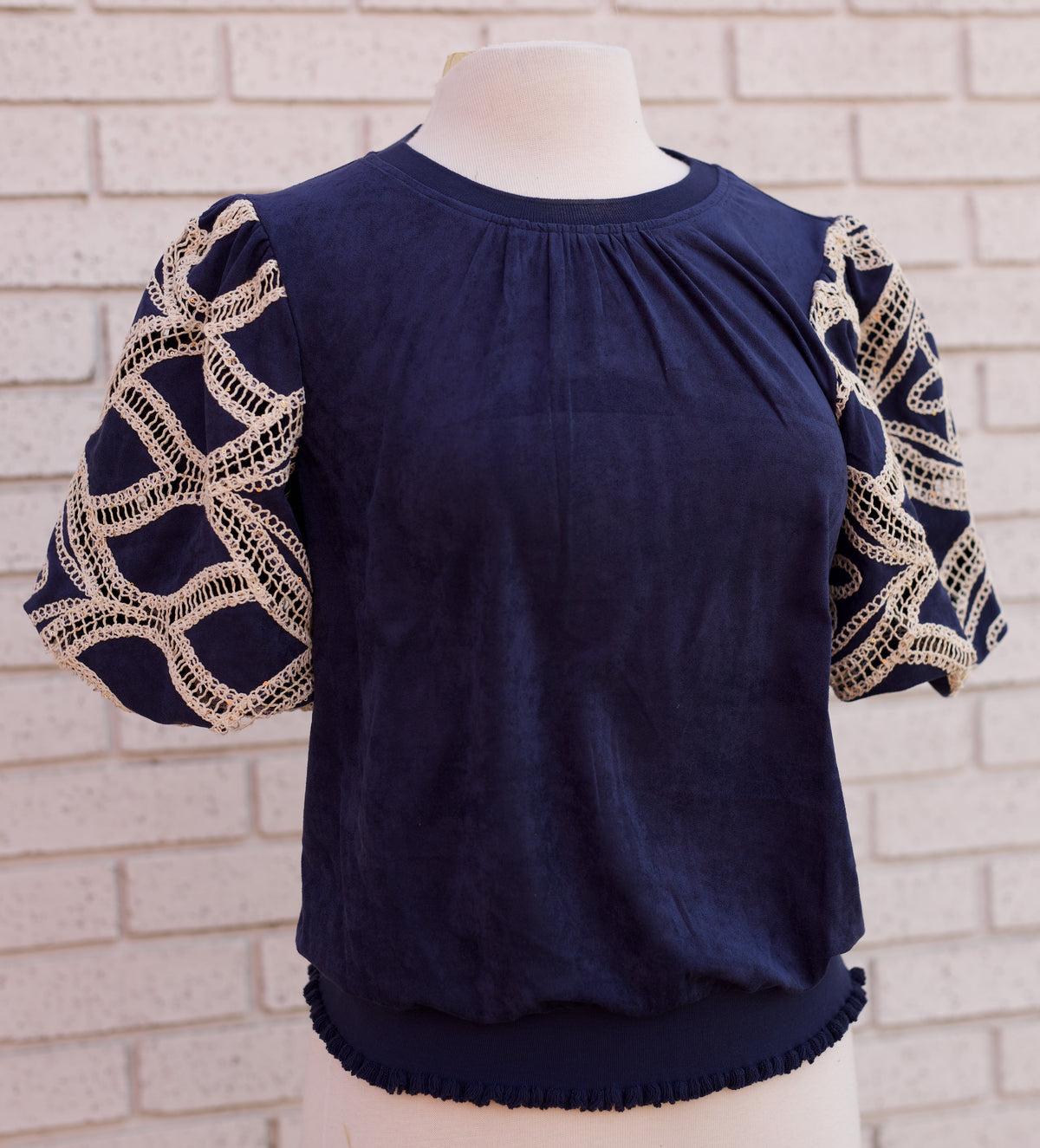 FLORAL EYELET CROCHET BUBBLE SLEEVE SUEDE TOP