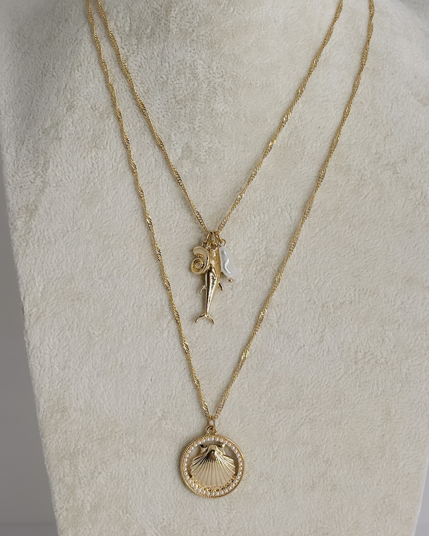 GOLD TWO STRAND NECKLACE WITH FISH & SHELL PENDANTS