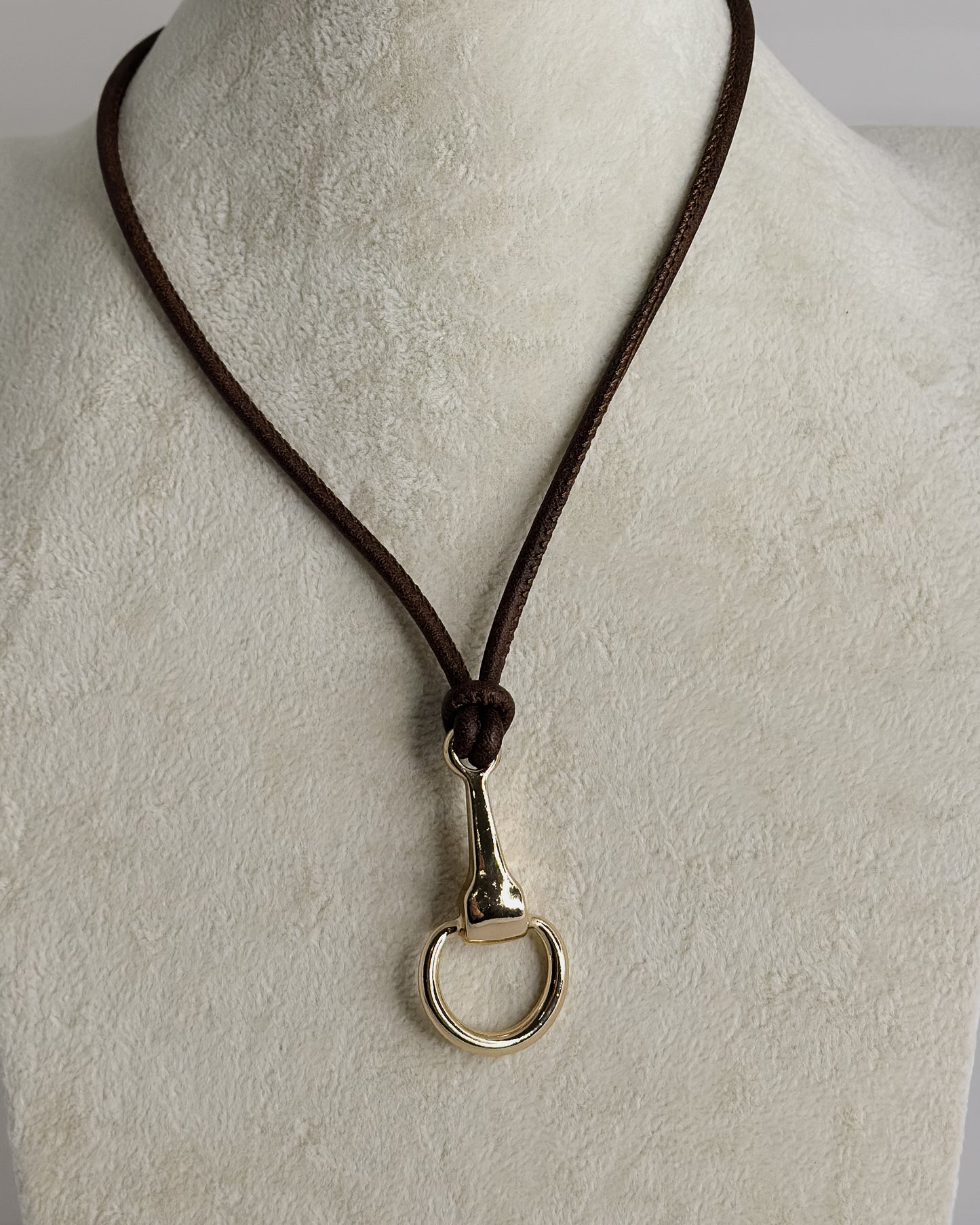 BROWN CORD NECKLACE W/GOLD HORSEBIT