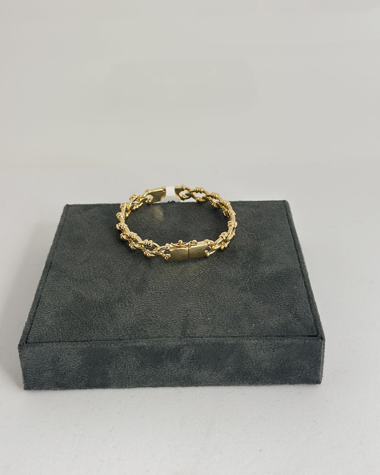 HINGED GOLD BANGLE BRACELET WITH BEADED LINKS