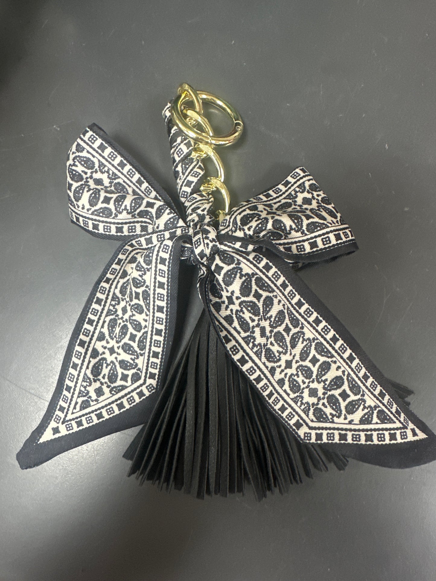 BOW SCARF WITH TASSEL PURSE CHARM