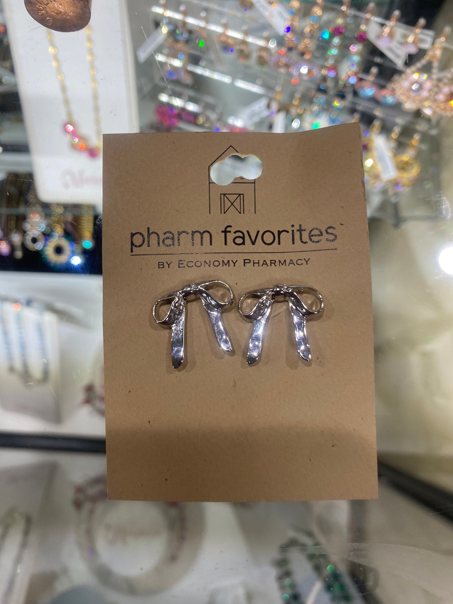 SILVER TEXTURED BOW EARRINGS