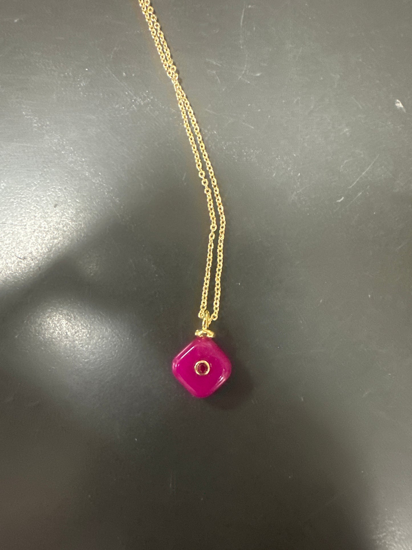 GOLD CHAIN WITH DARK PINK DIAMOND SHAPED STONE