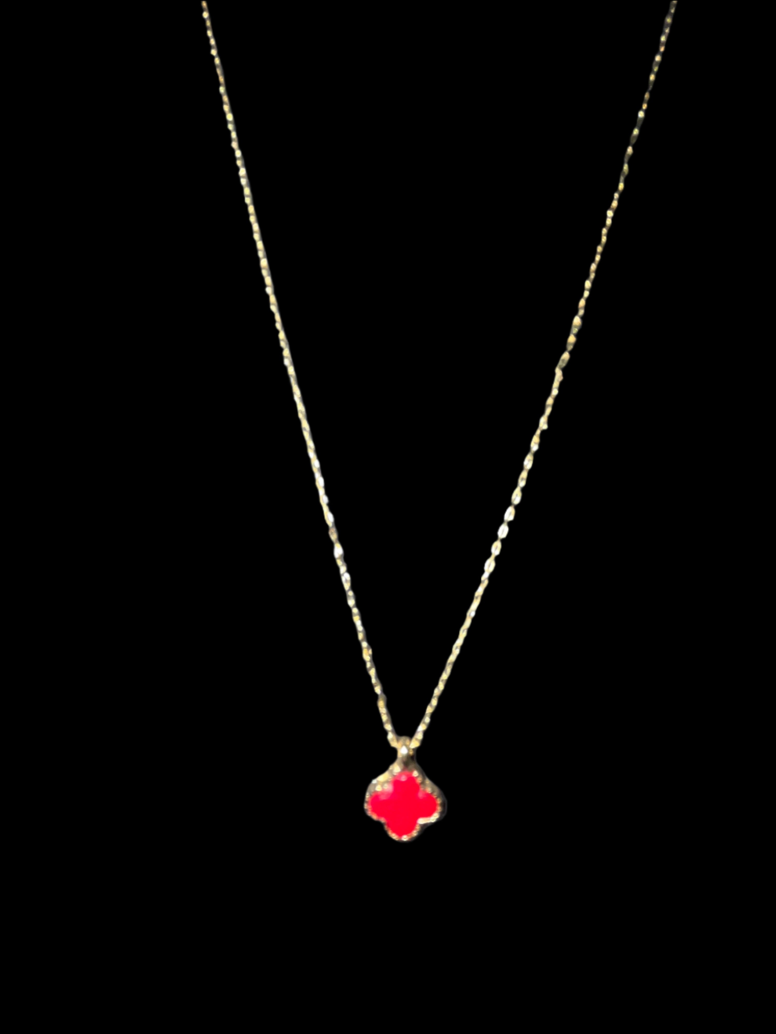 GOLD NECKLACE WITH SMALL RED CLOVER PENDANT