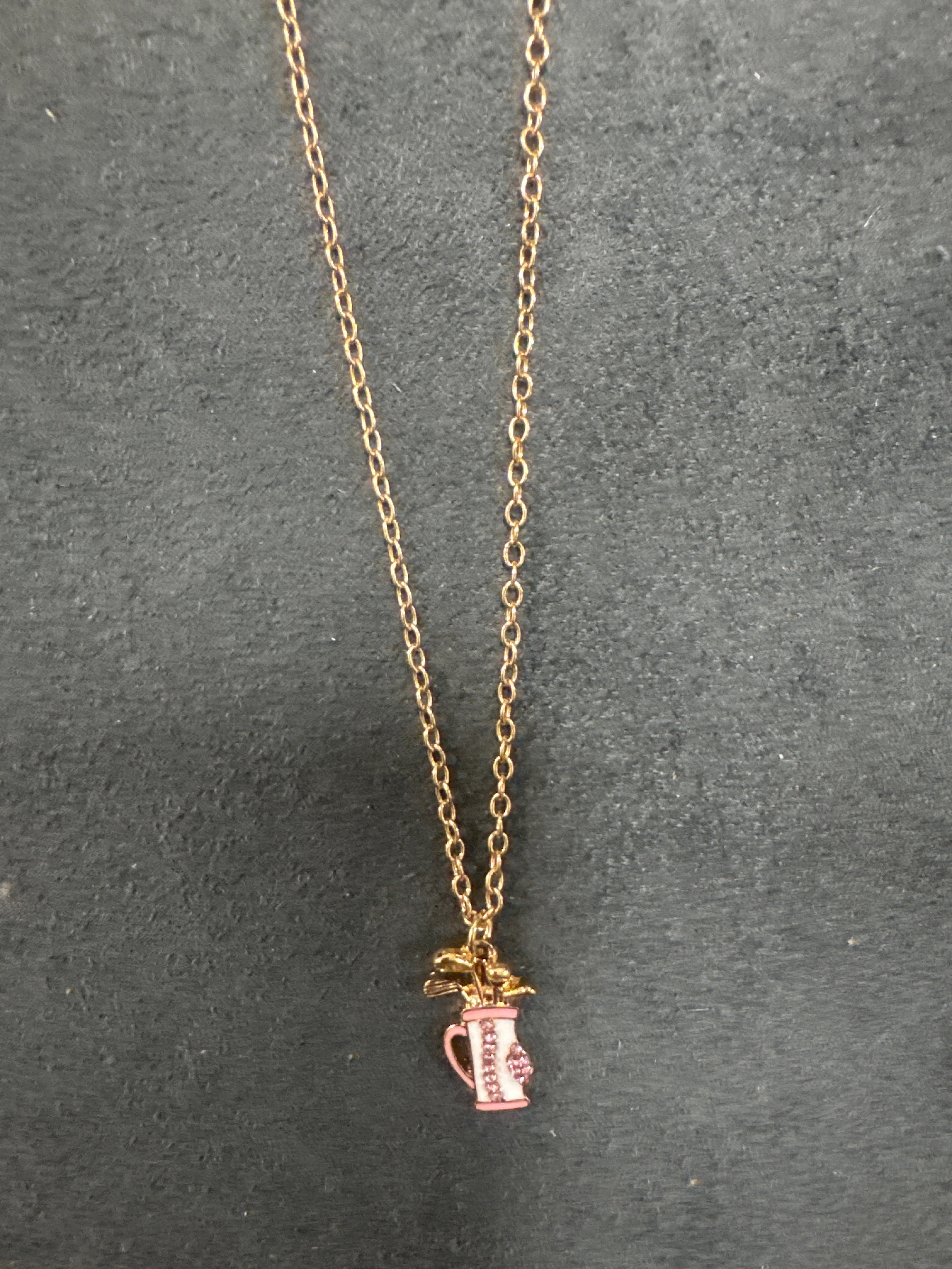 GOLD NECKLACE W/PINK & WHITE GOLF BAG PENDANT