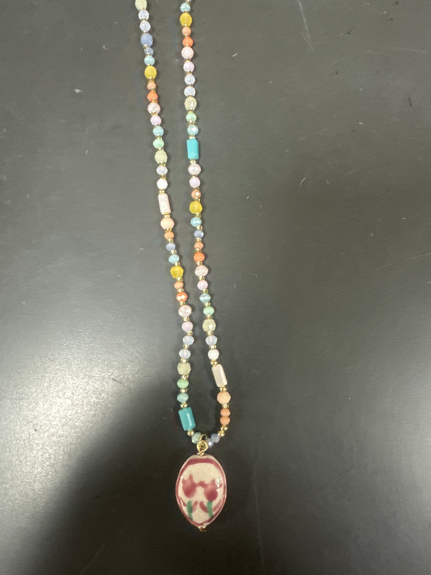 MULTI COLOR BEADED NECKLACE WITH FLORAL PENDANT