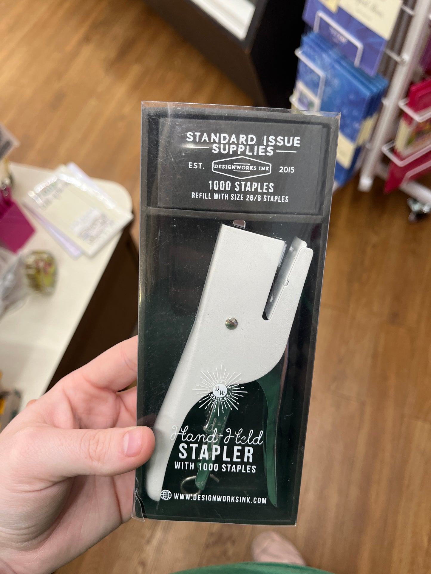 HAND HELD STAPLER