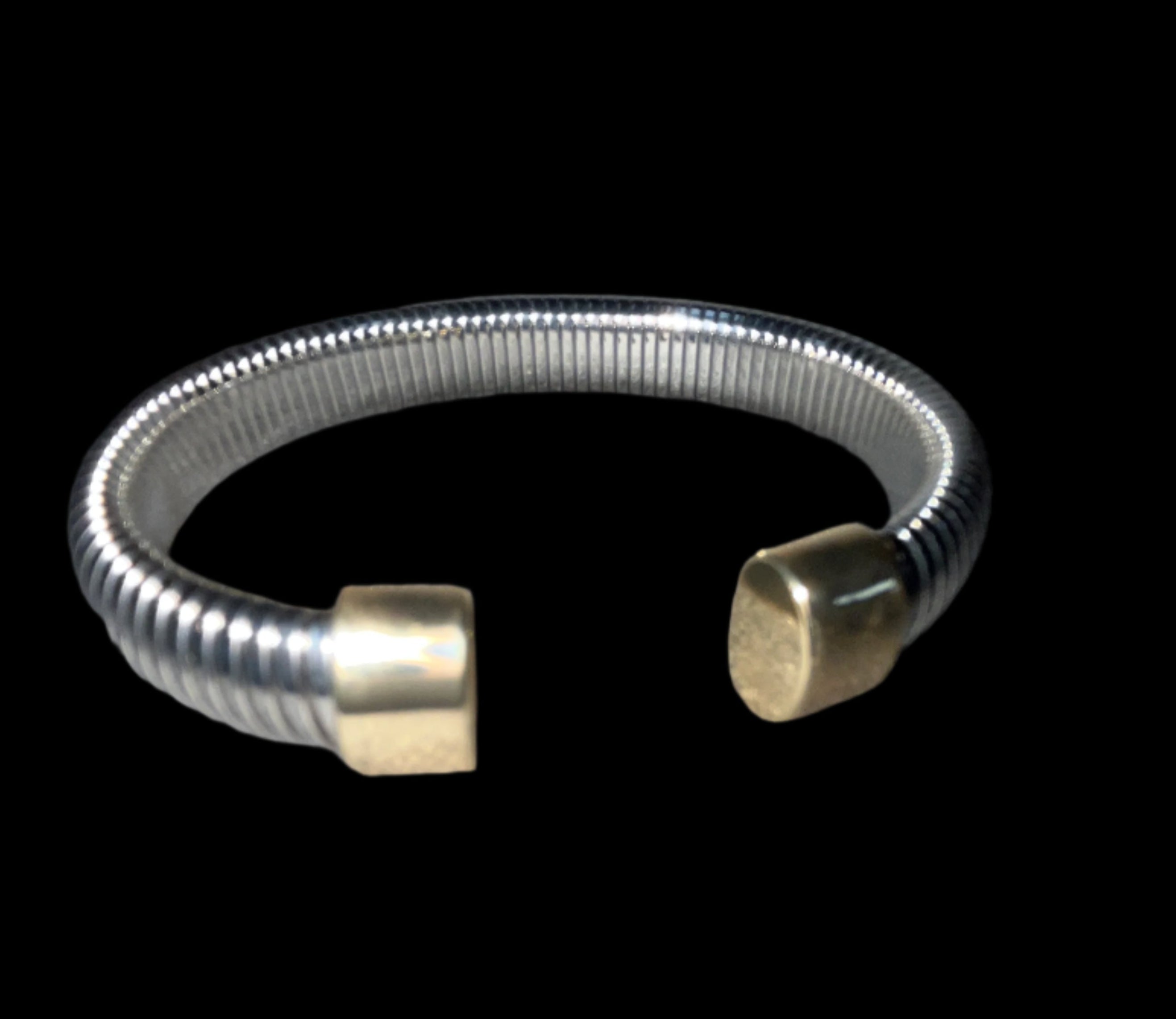 SILVER CABLE BRACELET WITH GOLD TIPS