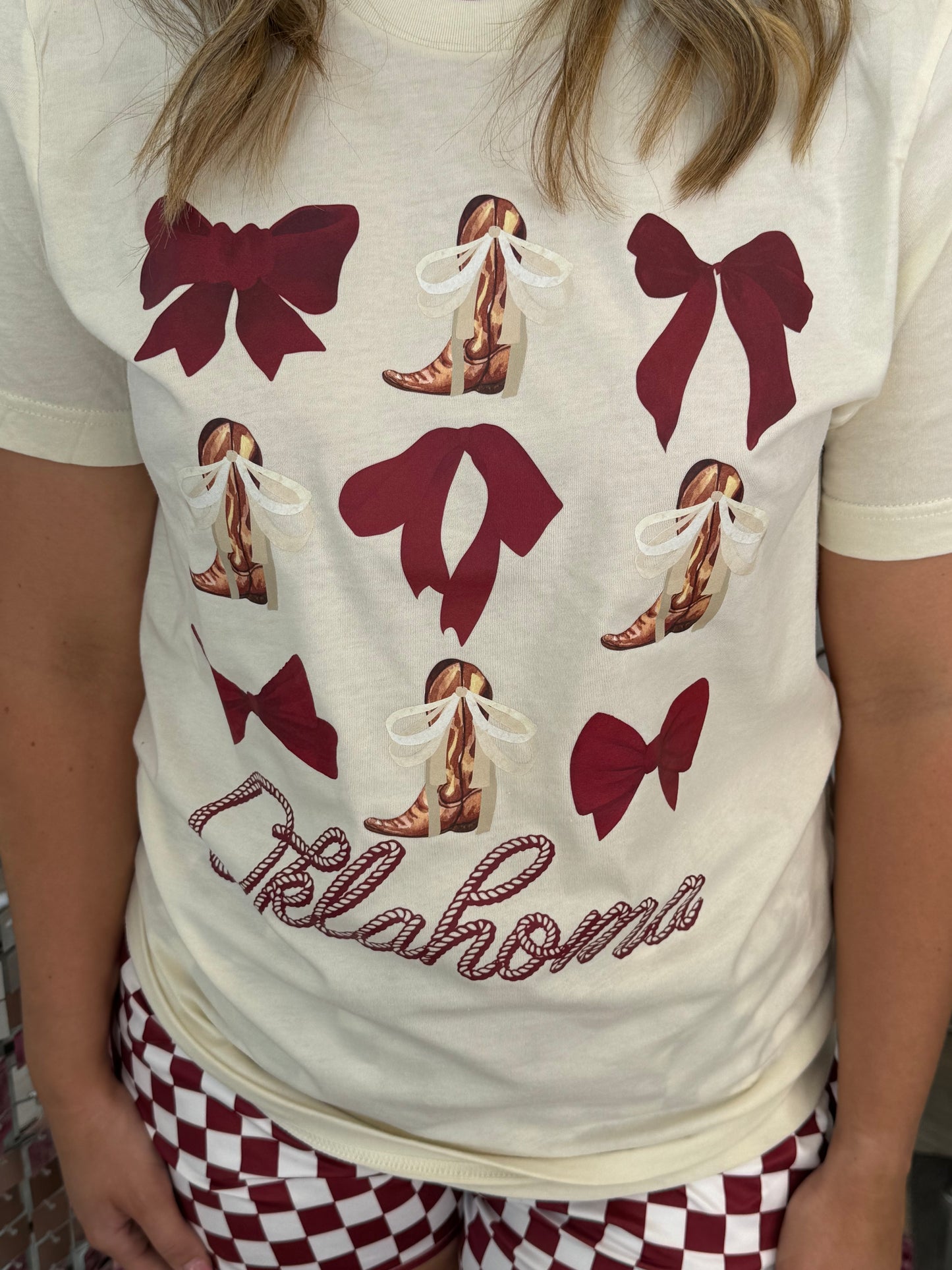 Oklahoma Crimson and Cream Bow & Boots Tee