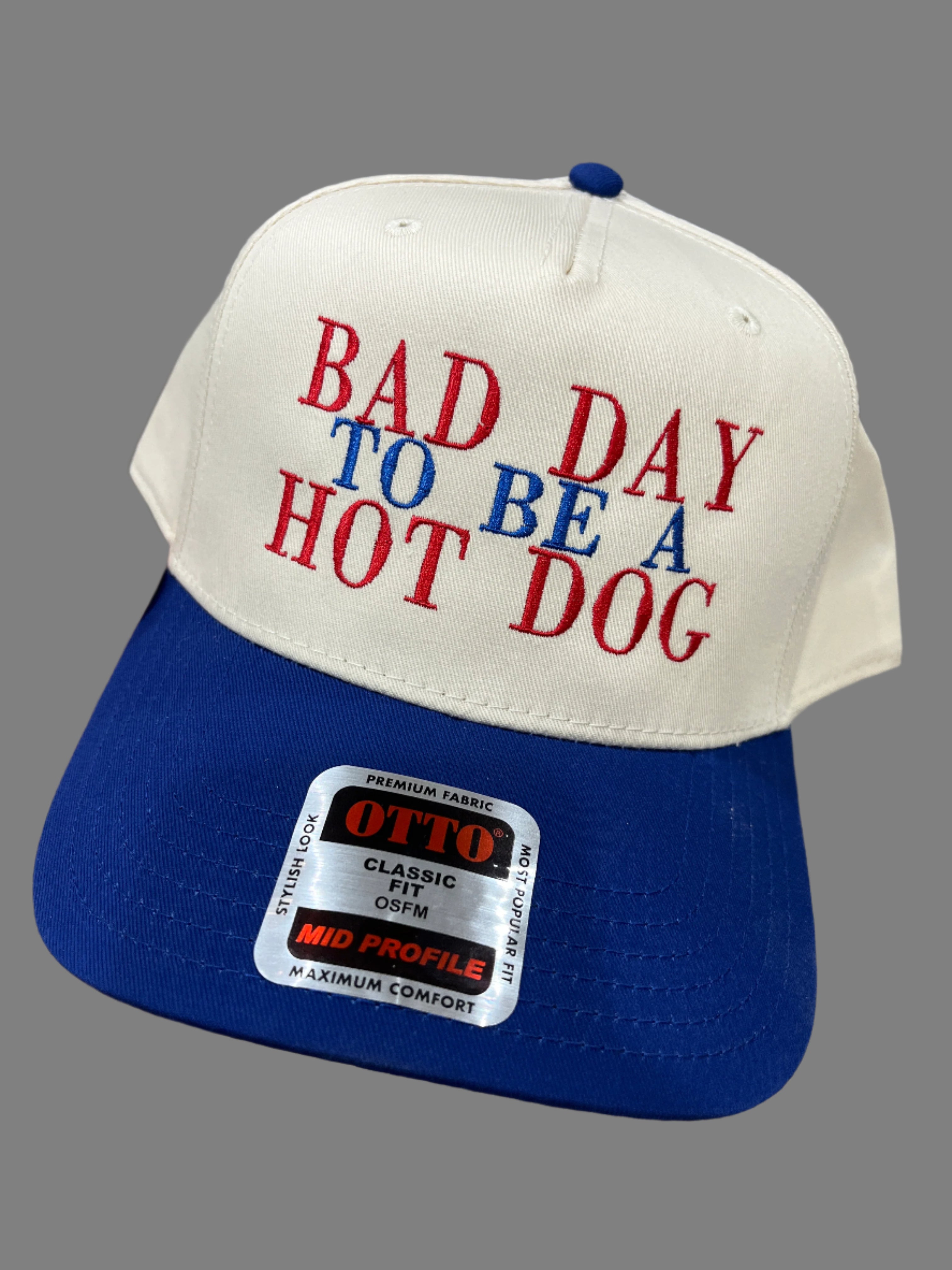 IVORY/ROYAL BLUE HAT - BAD DAY TO BE A HOT DOG