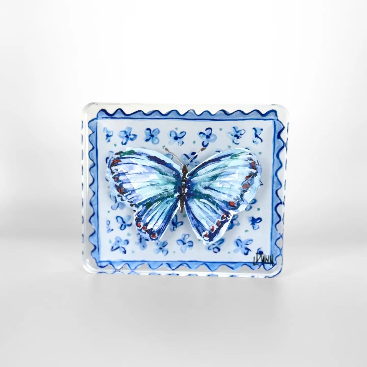 BLUE BUTTERFLY ON FLORAL BLOCK