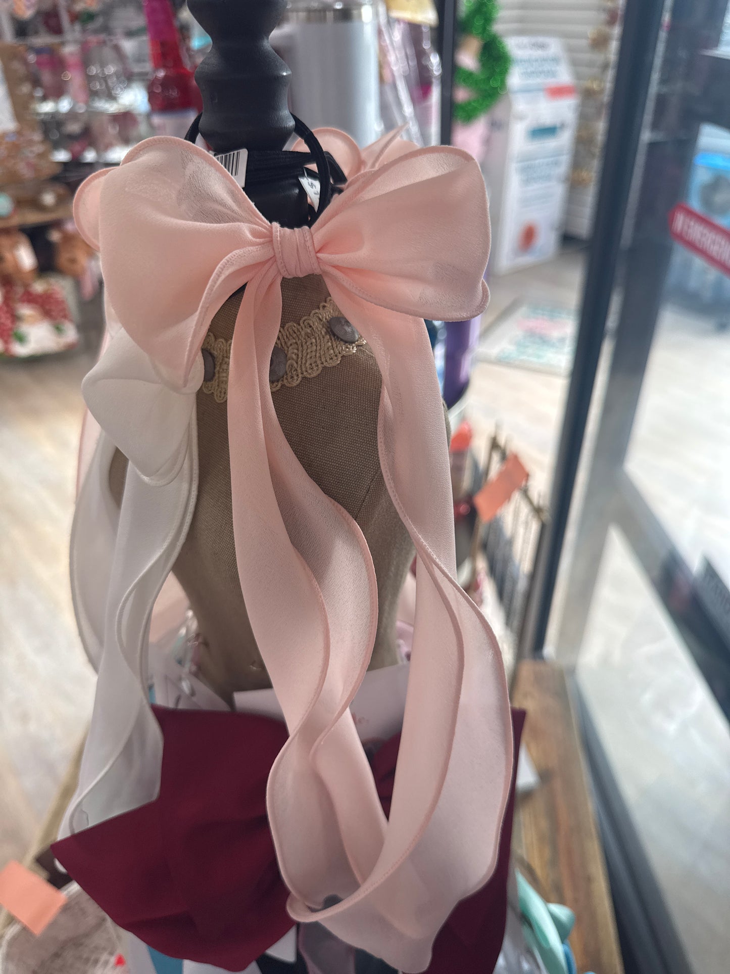 PINK CURLY BOW PONYTAIL HOLDER