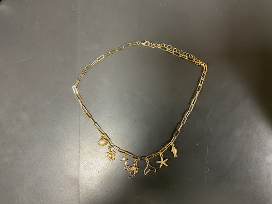 GOLD SEA CREATURE CHARM NECKLACE