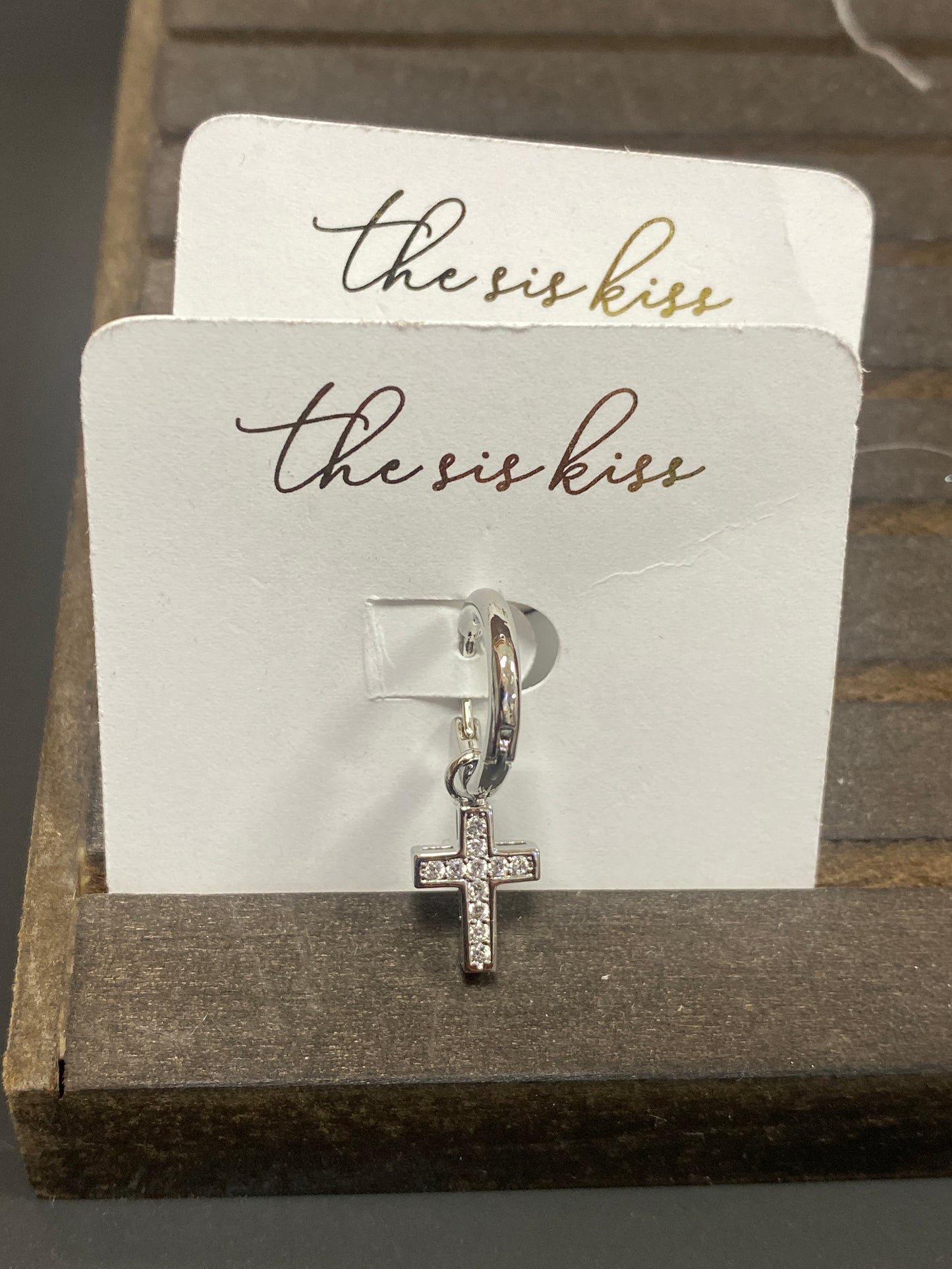 SILVER HUGGIE W/CROSS