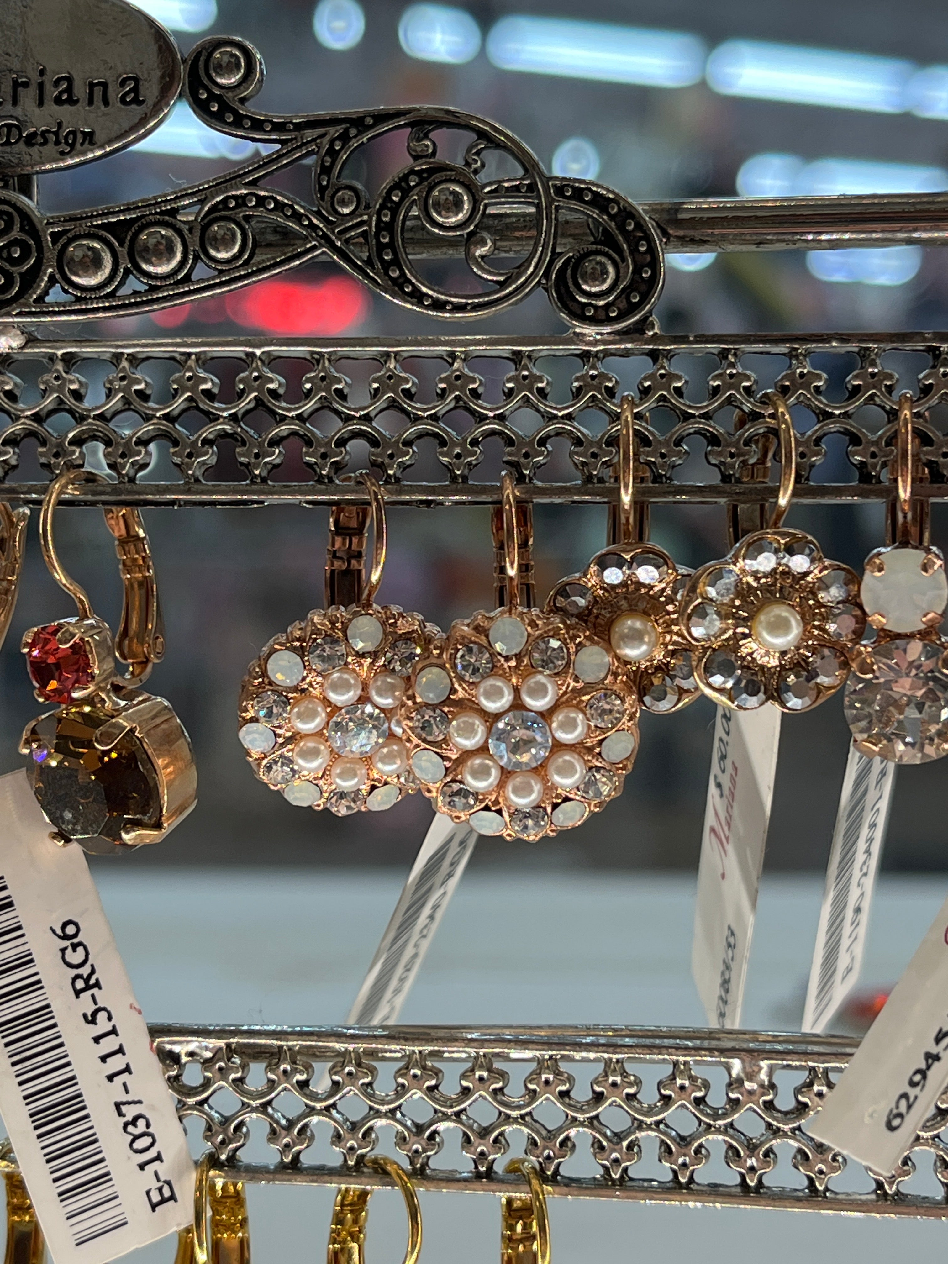 RG CLEAR IRDSCNT PEARLY EARRINGS