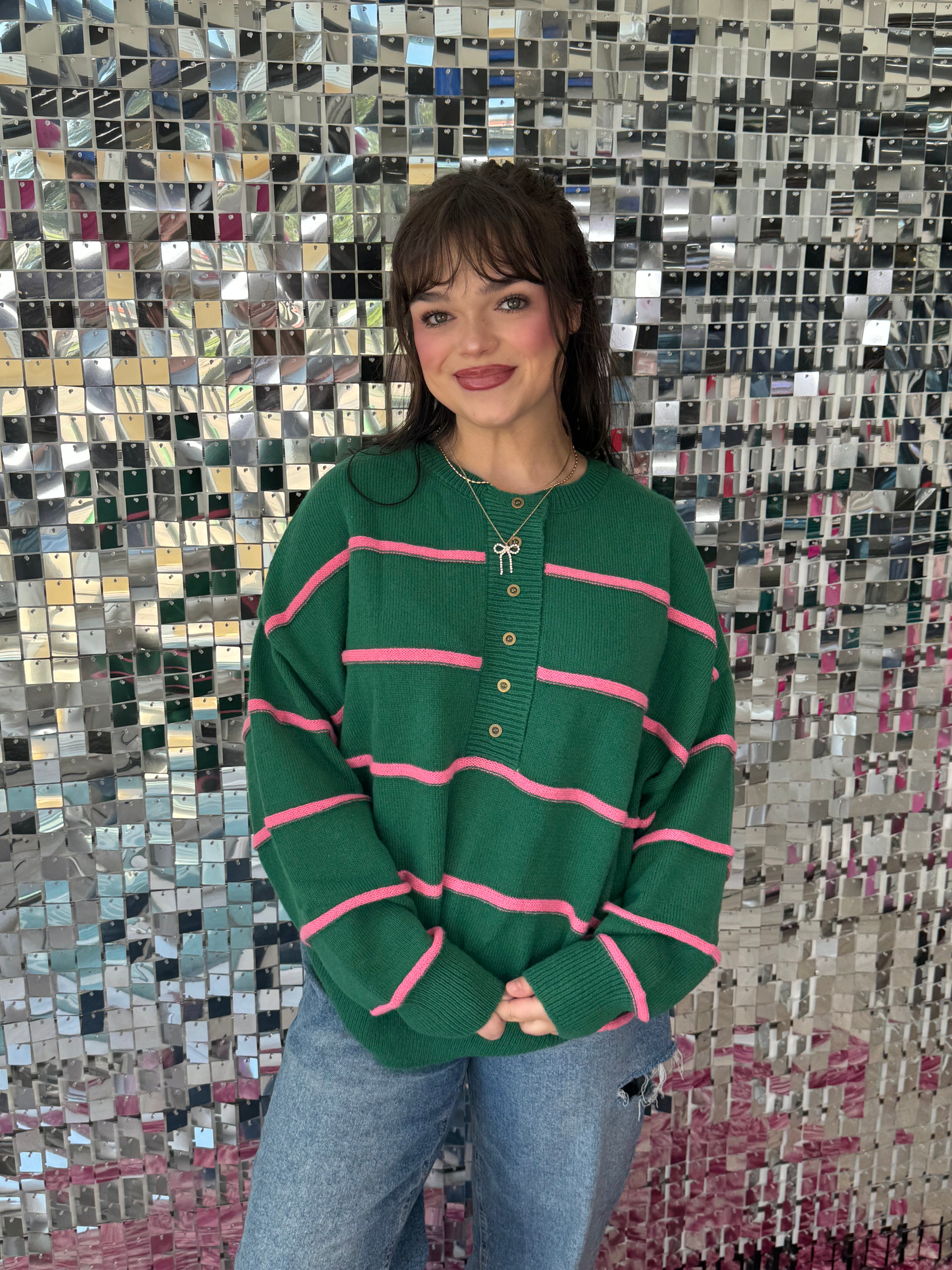 Green Sweater with Pink Stripes and Buttons