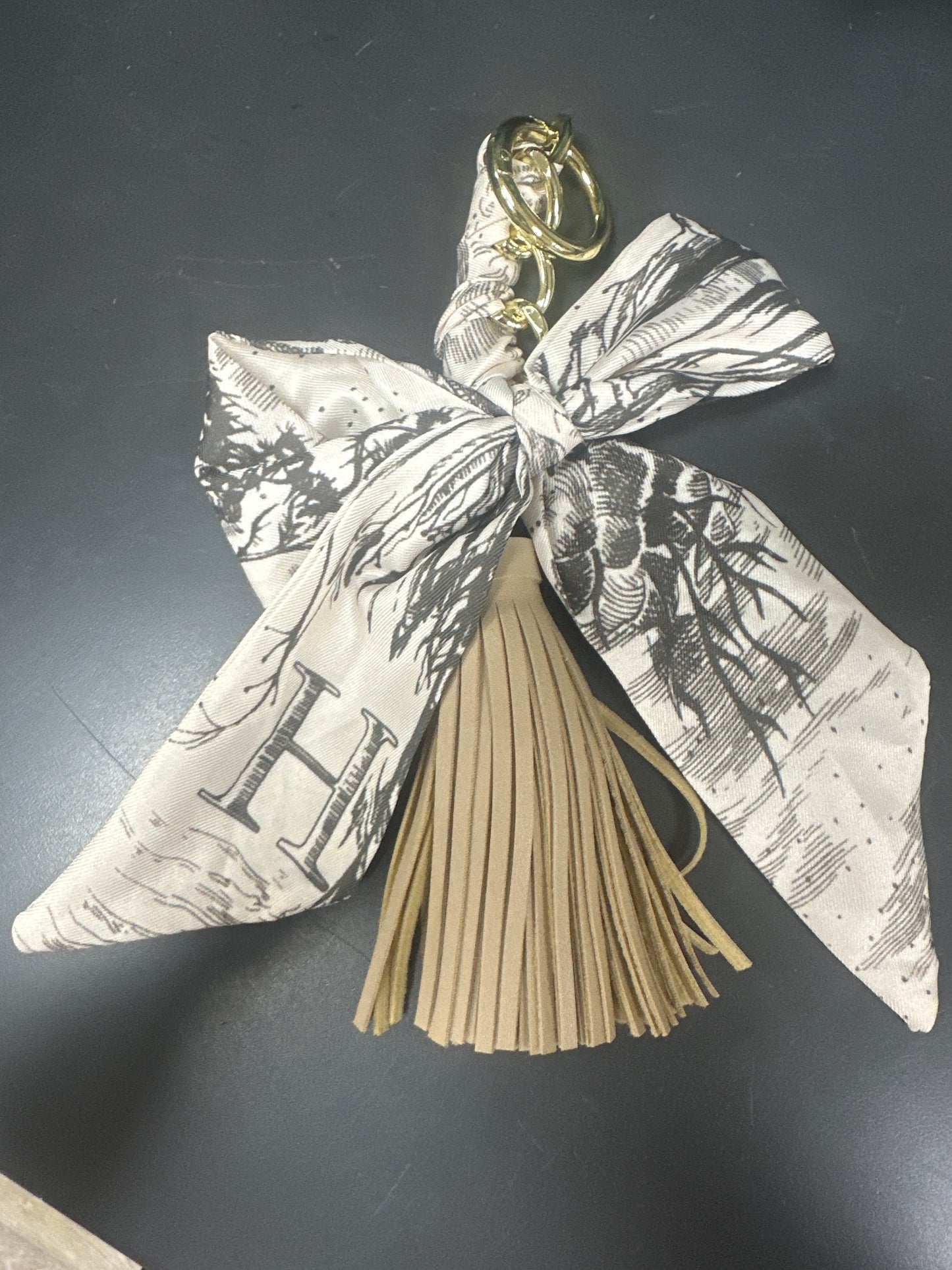 BOW SCARF WITH TASSEL PURSE CHARM