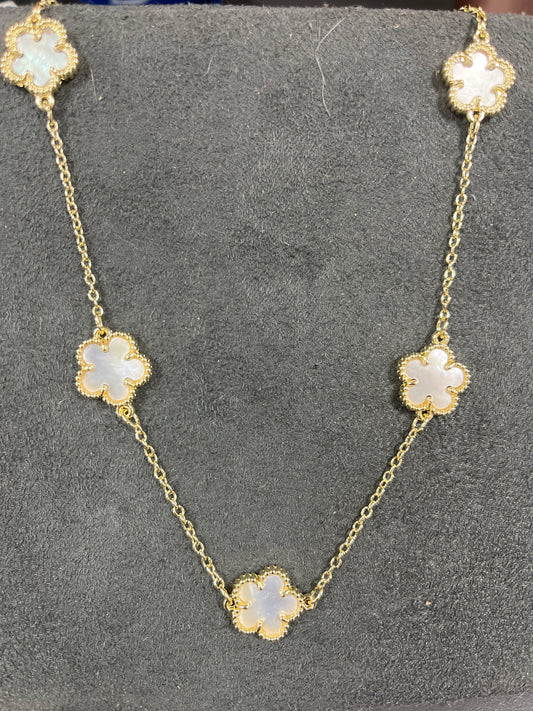 GOLD CHAIN W/FIVE IVORY CLOVERS