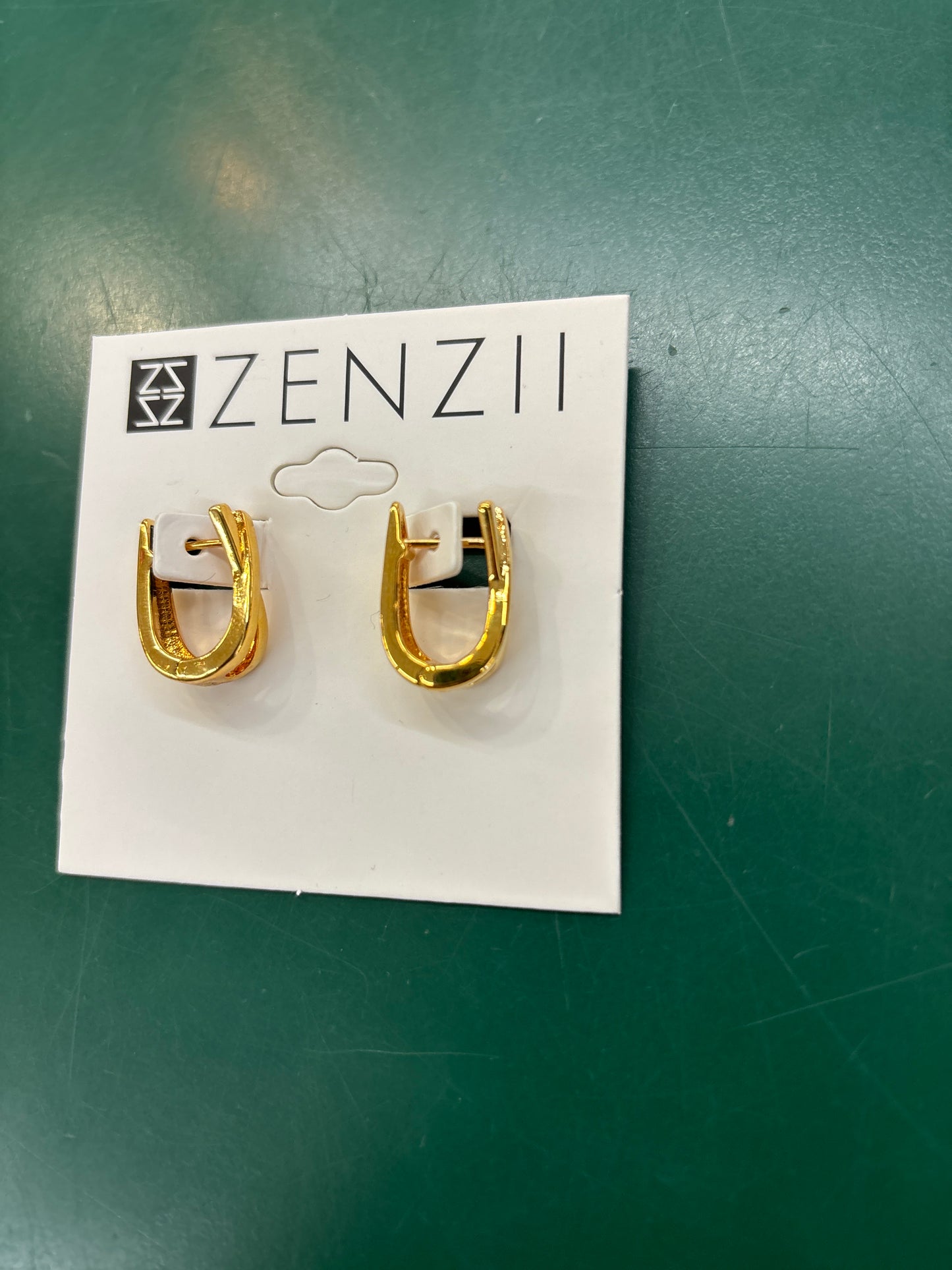 CRISSCROSS HUGGIE EARRINGS - GOLD