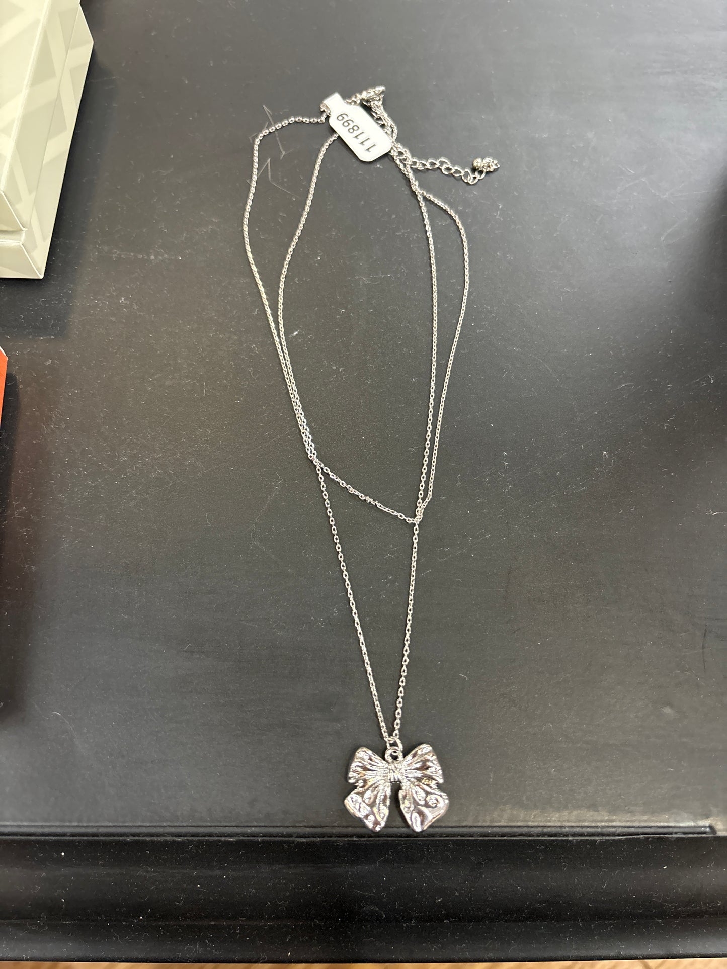 DOUBLE STRAND SILVER CHAIN W/BOW