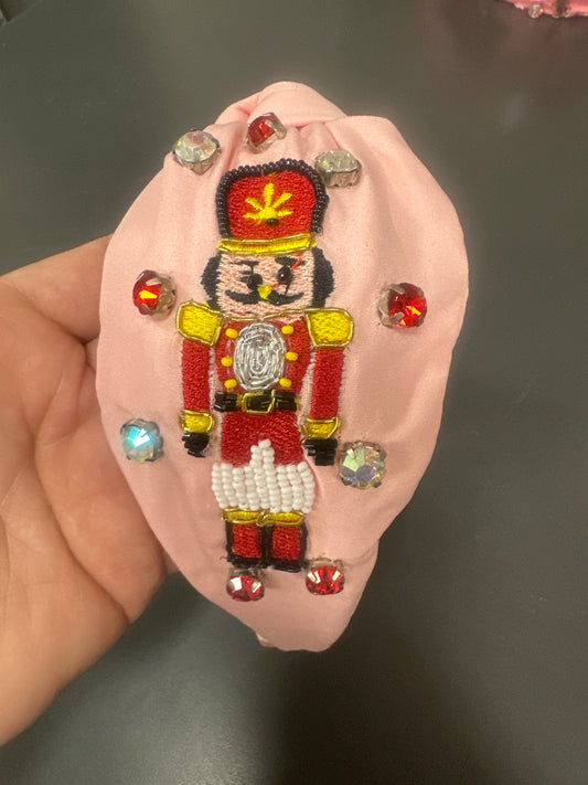 Pink Headband w/ Red, Black & Yellow Nutcracker