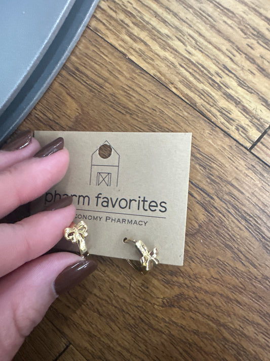 BOW HUGGIE EARRINGS - GOLD