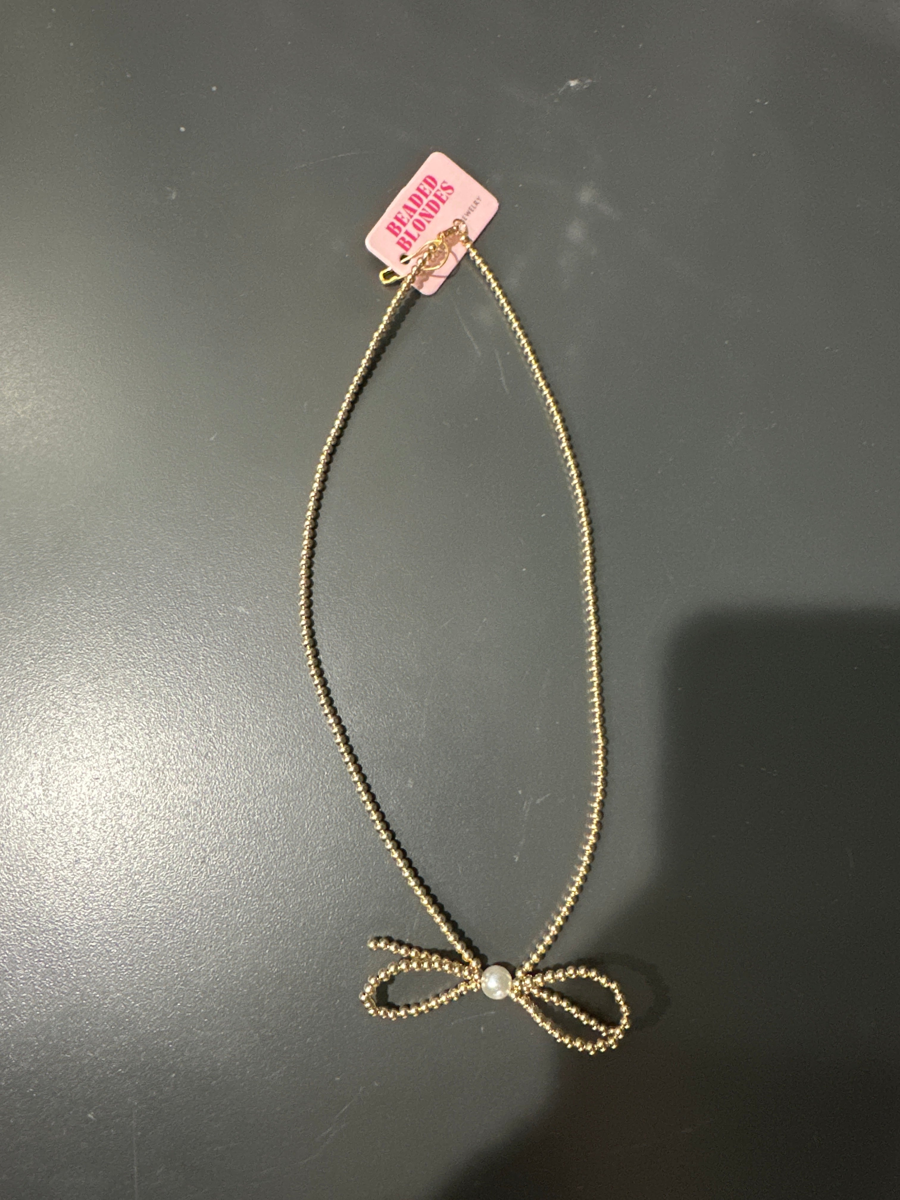 GOLD BEADED BOW NECKLACE - 18"