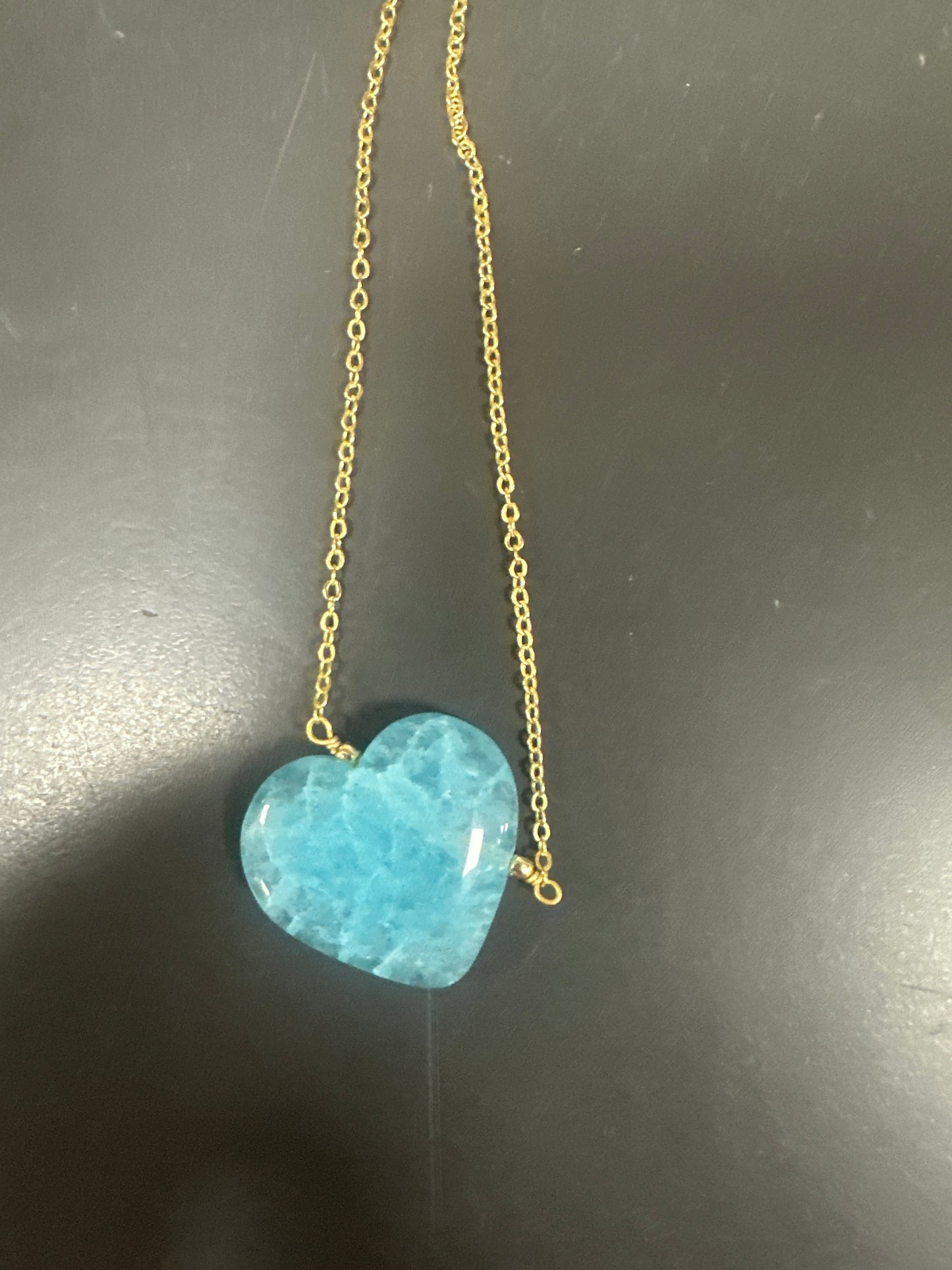 GOLD CHAIN WITH HEART SHAPED STONE