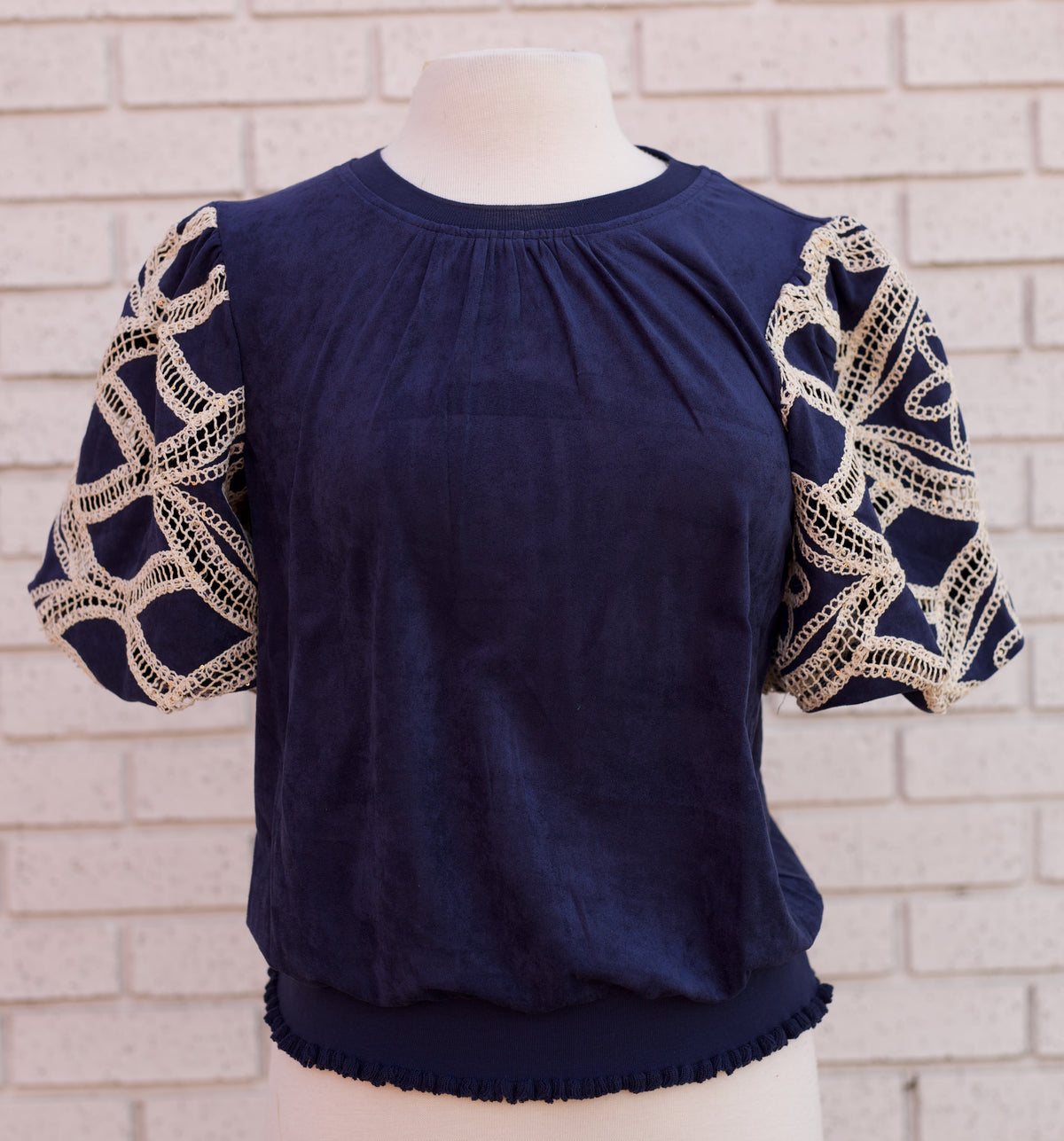 FLORAL EYELET CROCHET BUBBLE SLEEVE SUEDE TOP