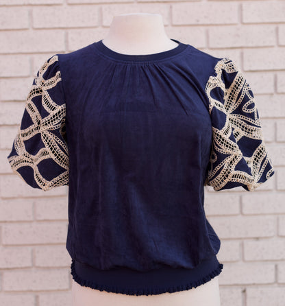 FLORAL EYELET CROCHET BUBBLE SLEEVE SUEDE TOP