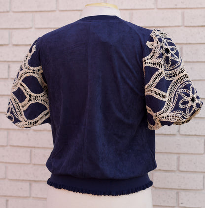 FLORAL EYELET CROCHET BUBBLE SLEEVE SUEDE TOP