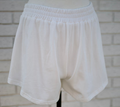 WHITE SKORT W/PEARL & PINK BOW DETAIL