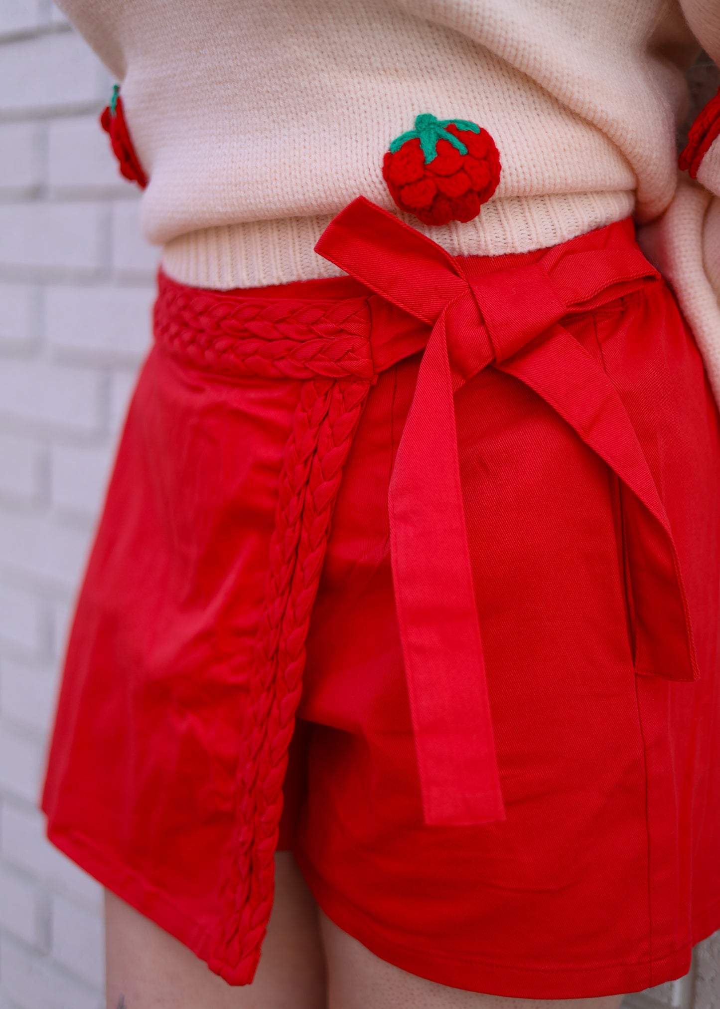 RED WRAP SKORT WITH BRAIDED DETAIL WRAP PANEL