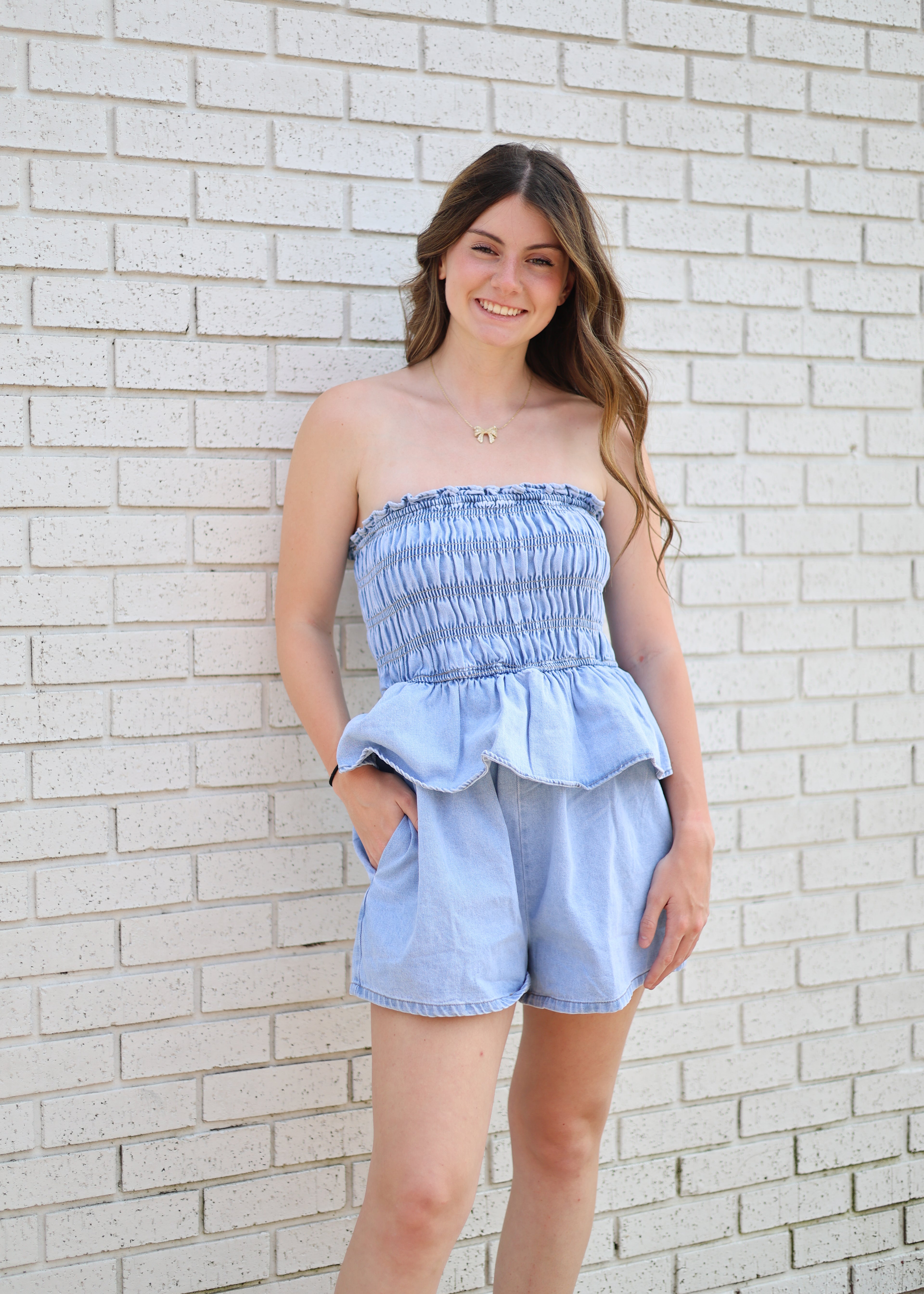 LIGHT DENIM SMOCKED TUBE TOP ROMPER