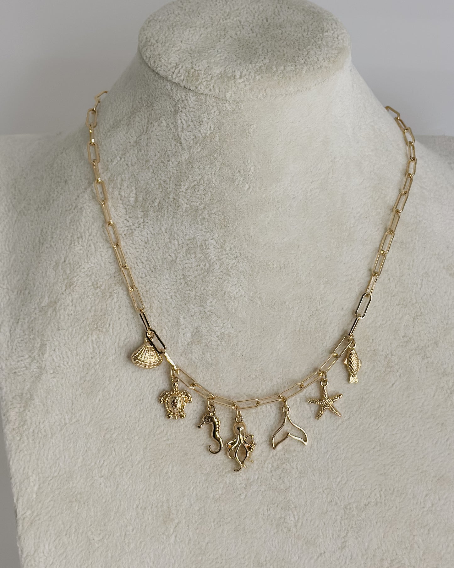 GOLD SEA CREATURE CHARM NECKLACE