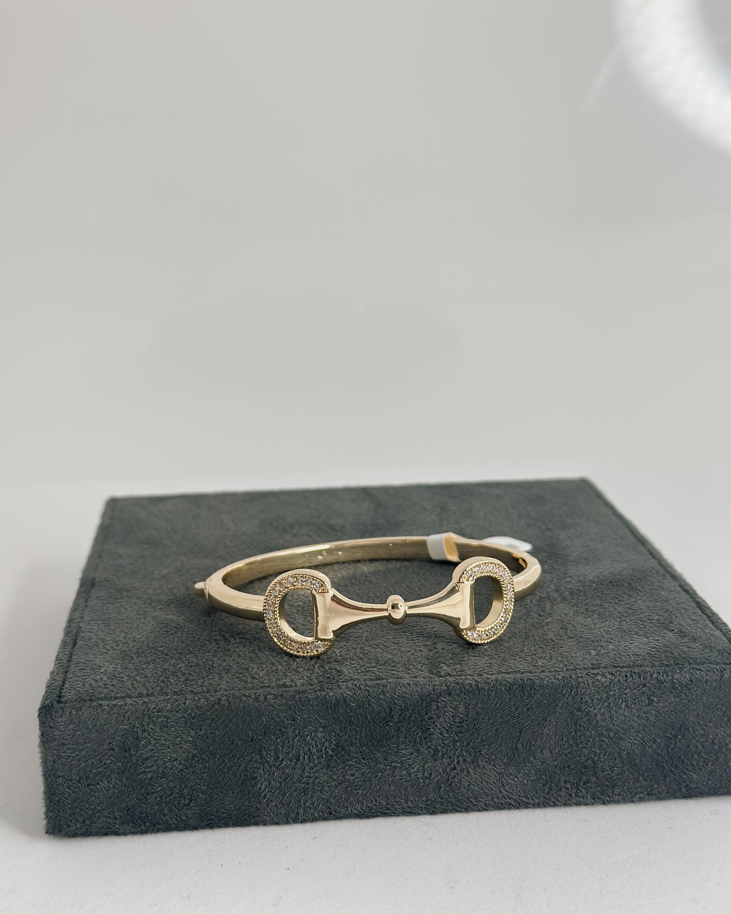 CRYSTAL EMBELLISHED HORSEBIT BANGLE BRACELET