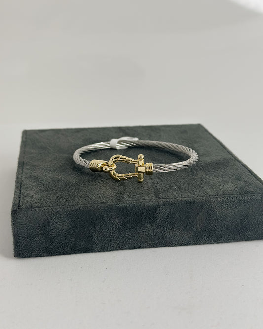 SILVER CABLE BRACELET WITH GOLD HOOK CLOSURE