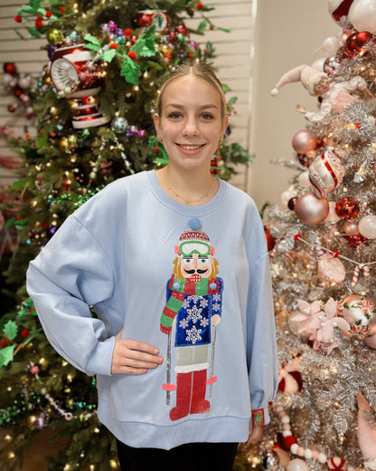 POWDER BLUE SKIING NUTCRACKER SWEATSHIRT