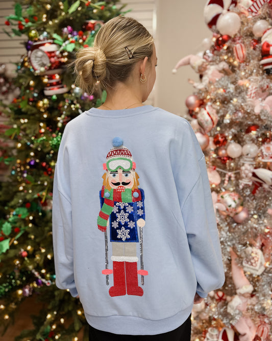 POWDER BLUE SKIING NUTCRACKER SWEATSHIRT