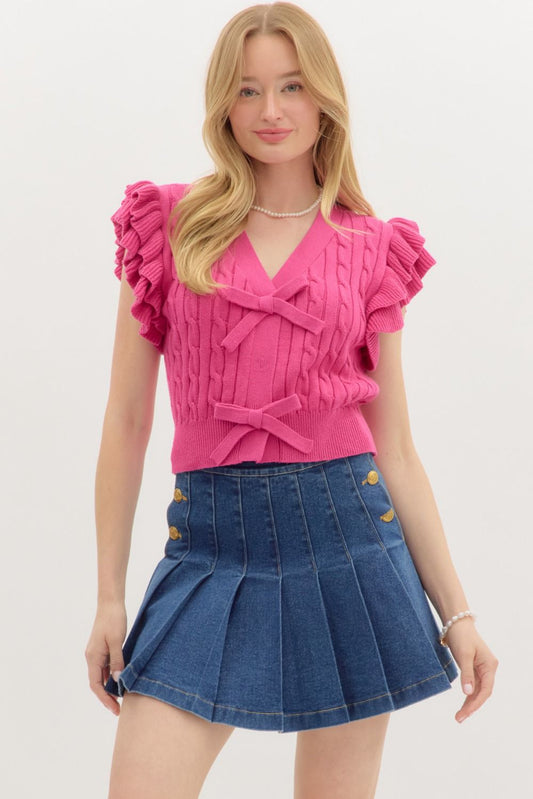 PINK CABLE KNIT SWEATER W/RUFFLE SLEEVE & BOW SNAP CLOSURE