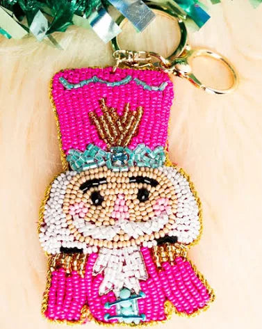 BEADED NUTCRACKER KEYCHAIN - FUSCHIA